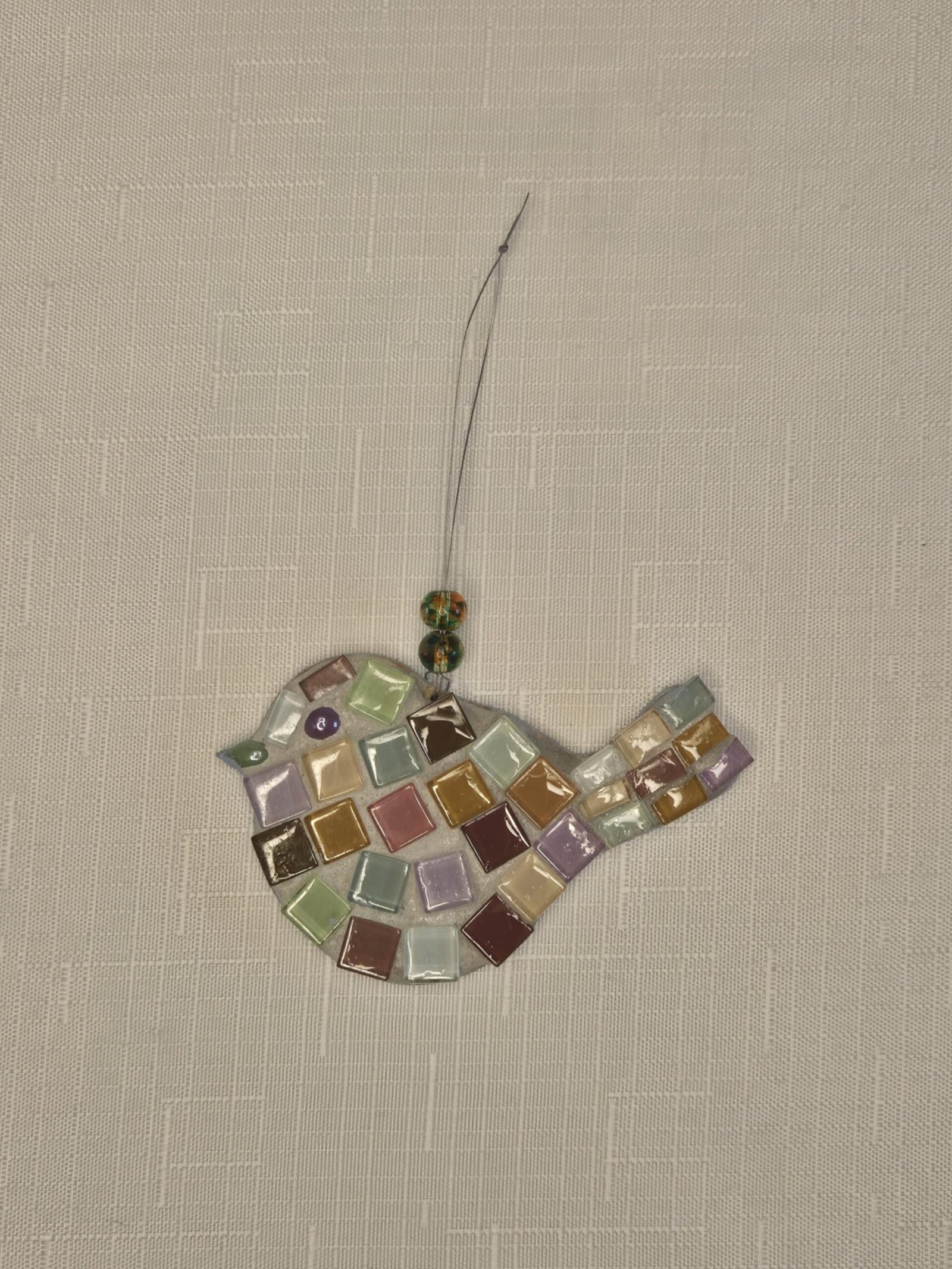 Small hanging bird